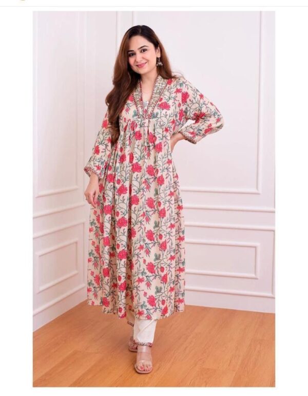 White-pink Floral Anarkali suit set decorated with the finest embroidery